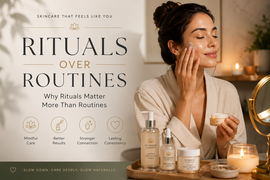 Woman applying skincare cream during a calming nighttime beauty ritual with luxury skincare products and the text “Rituals Over Routines” in a premium wellness setting.