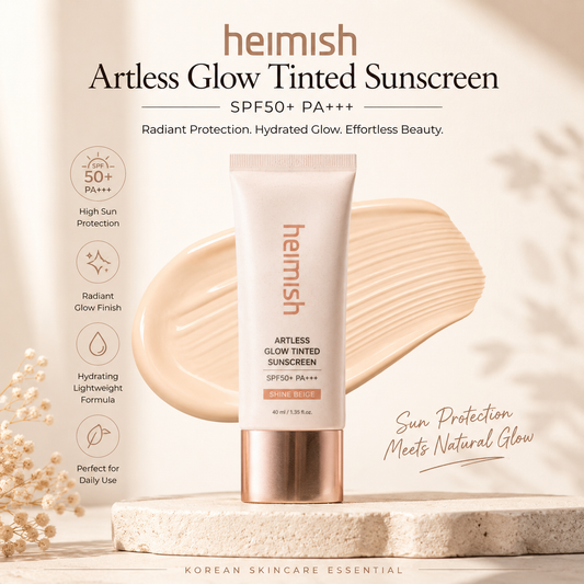 Heimish Artless Glow Tinted Sunscreen SPF50+ PA+++ hero product image with radiant beige glow finish on minimalist cream background.